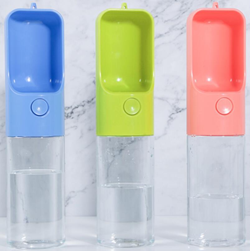 450ml pet travel water bottle with built-in drinking cup shown in blue, green and pink